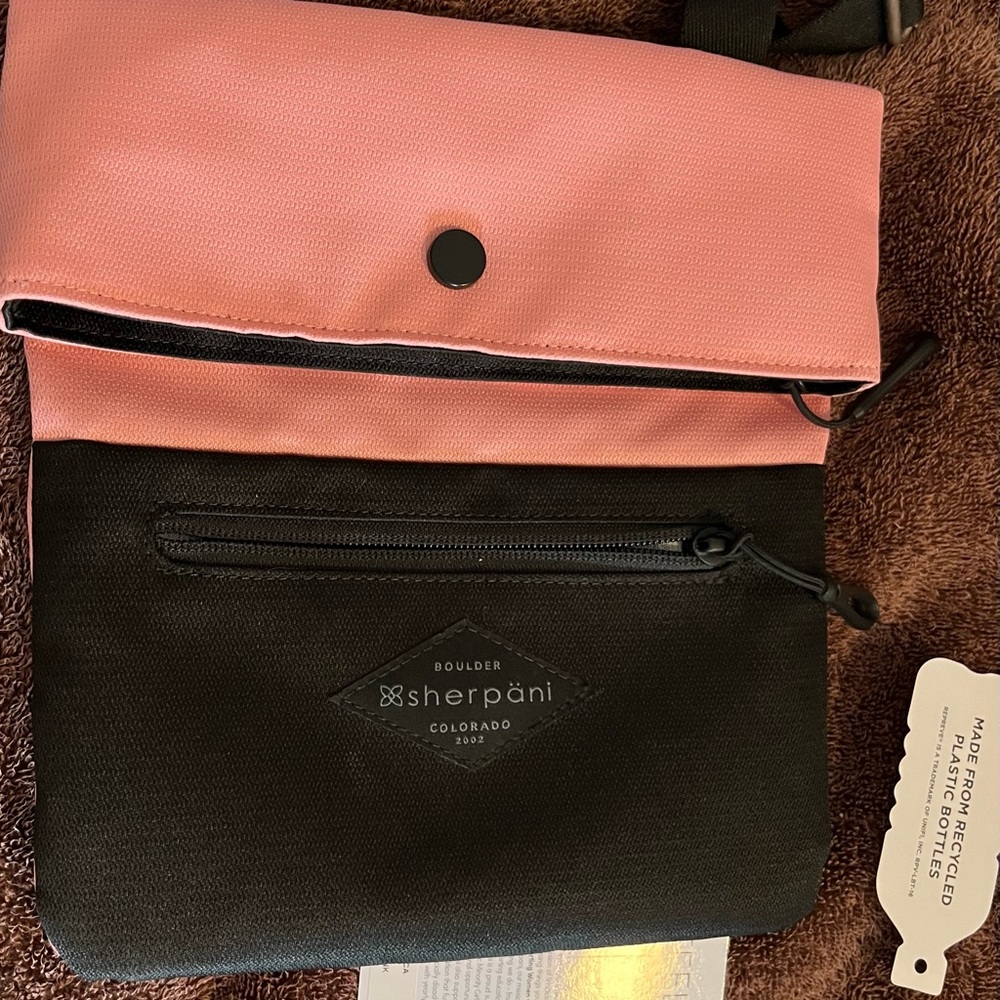 Sherpani Crossbody Bag in Pink and Black with Modern Design